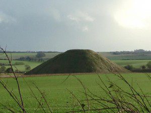 Silbury Hill - the ancient burial mound that stands nearby Avebury 